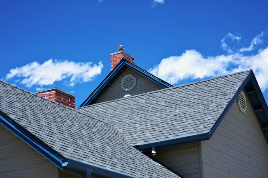 Asphalt shingles in summer heat on a Denton home